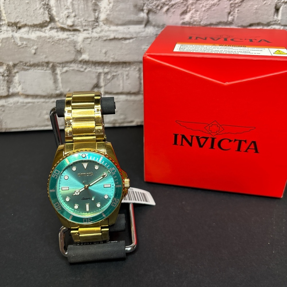 Invicta Diver Gold Watch with Teal Dial